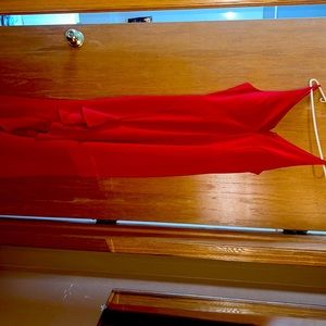 Red formal dress, spaghetti strap, v-neck and ruffled slit